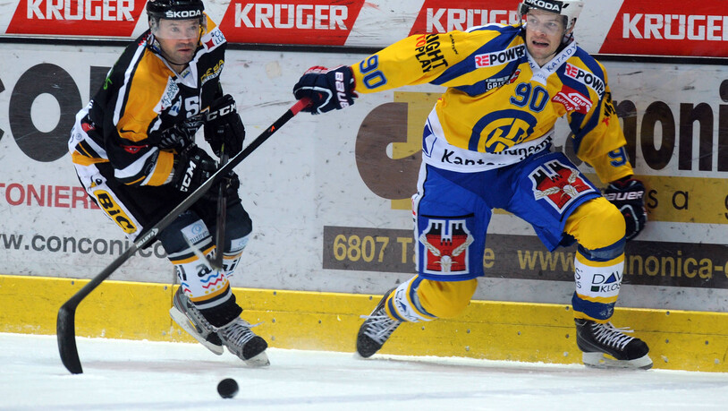 Damals noch auf dem Eis: Im Februar 2014 duellierte sich Luganos Glen Metropolit (links) mit Davos-Spieler Petr Taticek im NLA-Spiel zwischen dem HC Lugano und dem HC Davos.