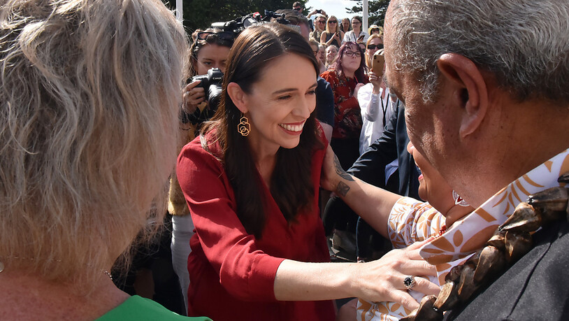 Jacinda Ardern is greeted by well-wishing staff and MPs as she heads from Parliament House to Government House, to resign her position as New Zealand Prime Minister, Wellington, Wednesday, January 25, 2023. (AAP Image/Ben McLay) NO ARCHIVING