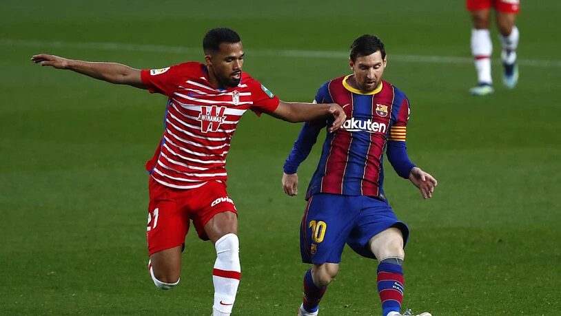 Lionel Messi (rechts) gegen Granadas Yangel Herrera