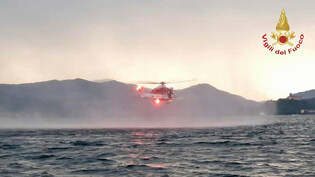 Am Sonntag, 28. Mai, suchen italienische Rettungskräfte nach dem Bootsunglück im Lago Maggiore nach vermissten Personen.