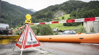 Geröll- und Schlammmassen: Der Erdrutsch vom 29. August zieht sich auf einer Länge von rund 400 Metern hin und zerstört oder beschädigt rund 40 Häuser.